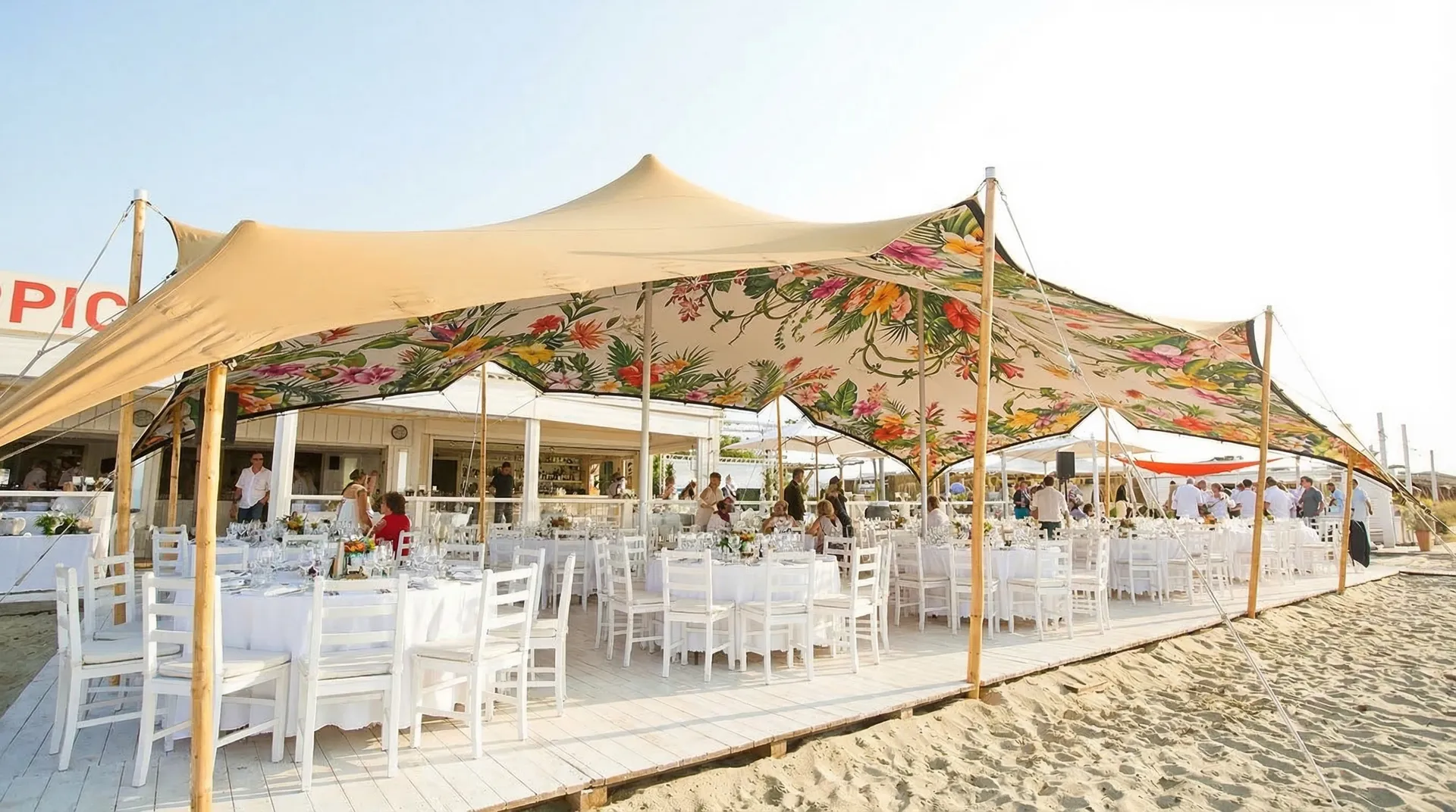Stretch tent with a custom-printed tropical floral skin
