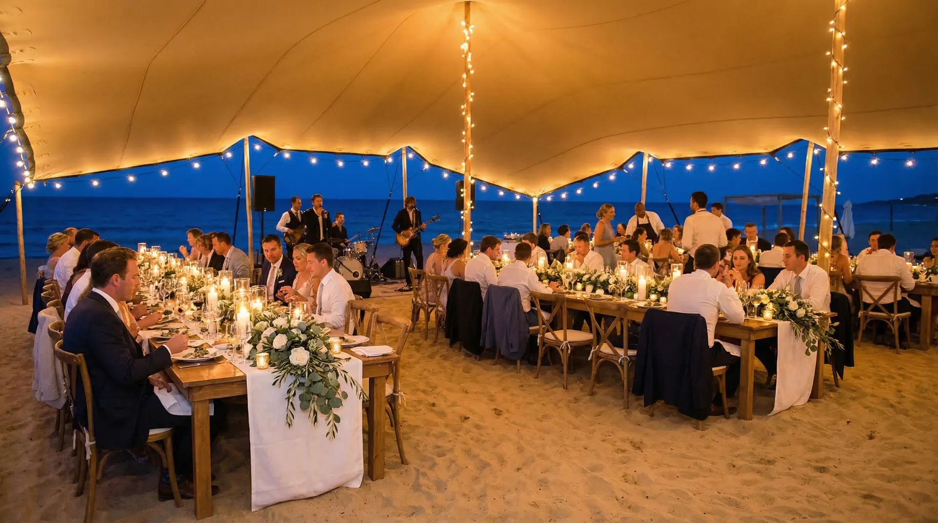 Wedding celebration under a Pop Pro Tents stretch tent