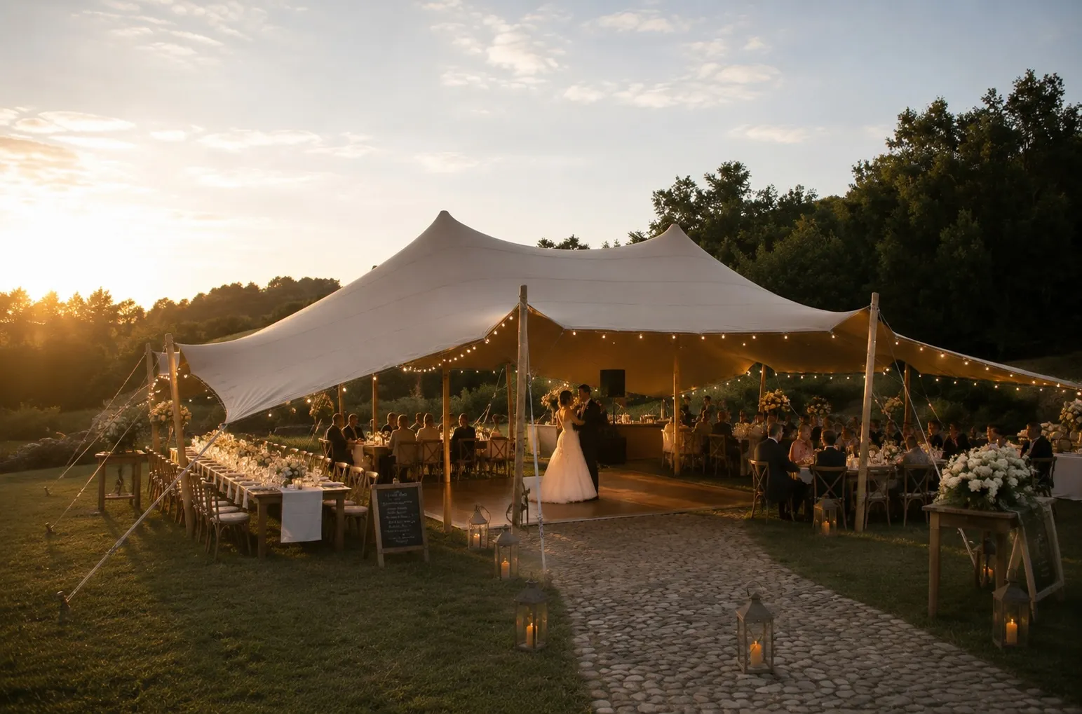 Wedding celebration under a Pop Pro Tents stretch tent