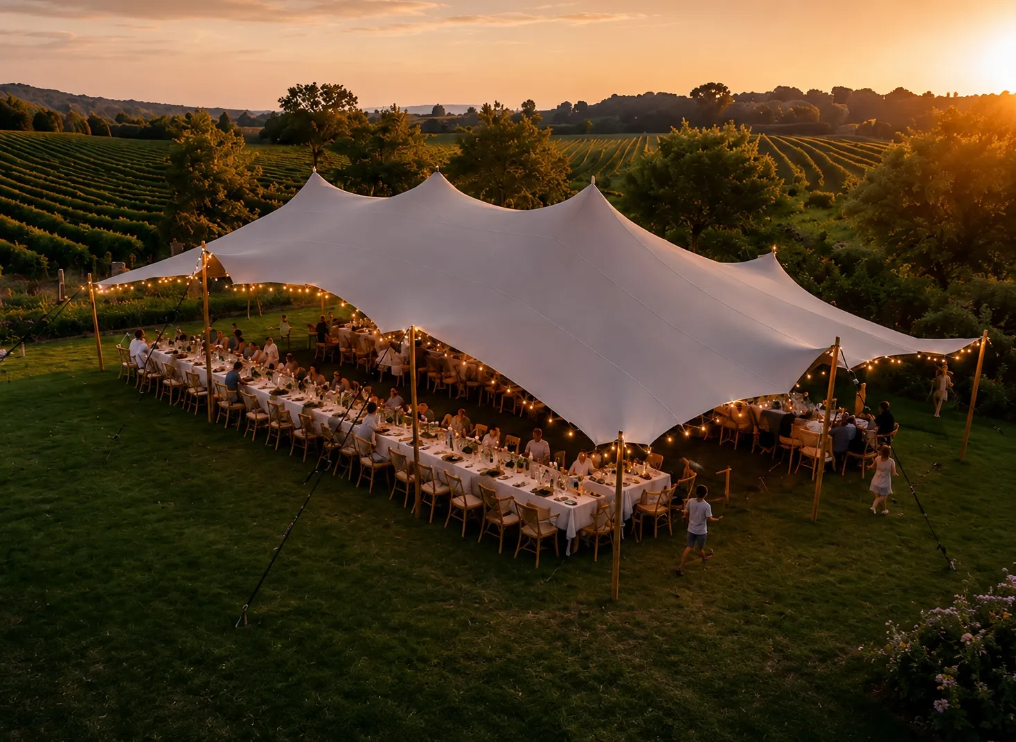 Wedding celebration under a Pop Pro Tents stretch tent